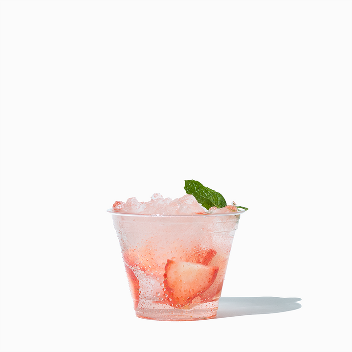 Frozen Dessert Supplies - UNIQ 9 oz Clear Plastic Disposable PET Cups - 1000/Case - Product in use