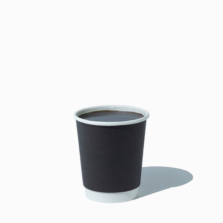 8 oz black double wall hot cup in use